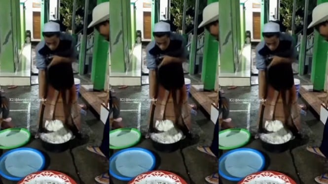 Viral! Video Pria Bersarung Nyendok Nasi Pakai Pacul
