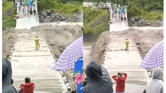 Pria terjang banjir di Makassar
